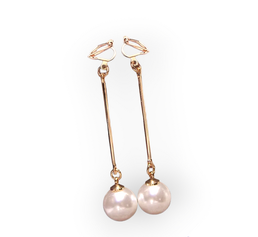 Long dangle pearl clip on earrings with elegant cascading pearls and secure clip backing