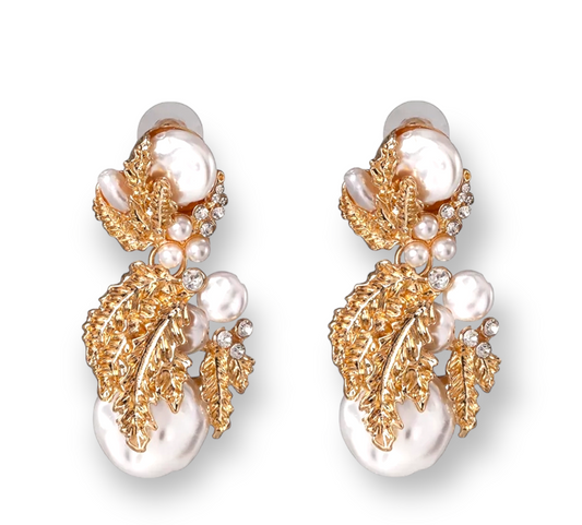 Elegant Pearls & Décor Earrings featuring lustrous pearls with decorative accents, perfect for formal or casual outfits.