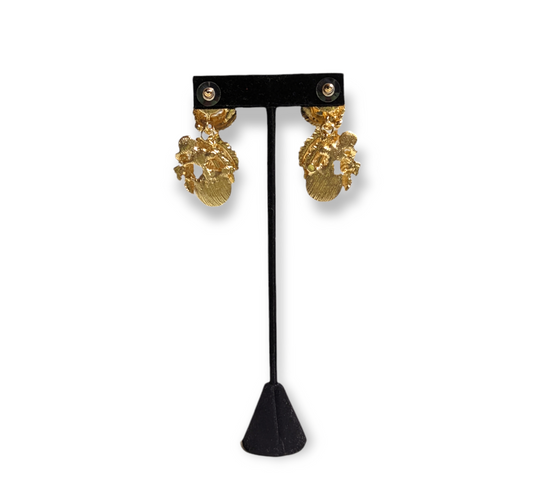 Elegant Pearls & Décor Earrings featuring lustrous pearls with decorative accents, perfect for formal or casual outfits.
