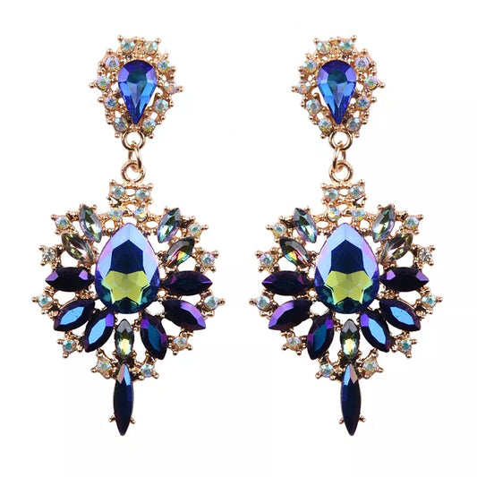 Queen Of Starburst Earrings with radiant starburst design.