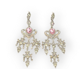 A pair of vintage style earrings with a pink heart design and long hanging tassels, decorated with crystals.