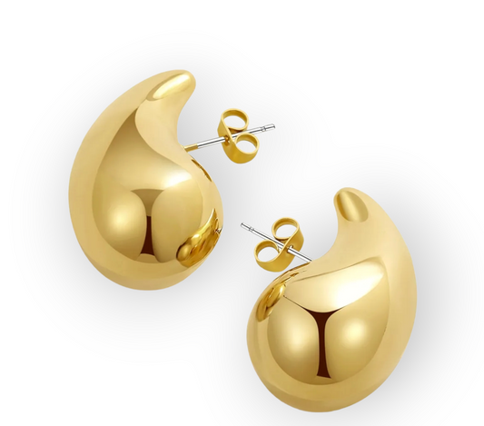 Close-up of Queens Golden Chucky Earrings chunky gold hoop earrings with polished finish
