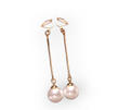 Long dangle pearl clip on earrings with elegant cascading pearls and secure clip backing