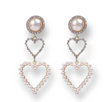 Pearla Loves Her Earrings featuring luminous pearls with a romantic, stylish design, perfect for elegant and casual outfits.