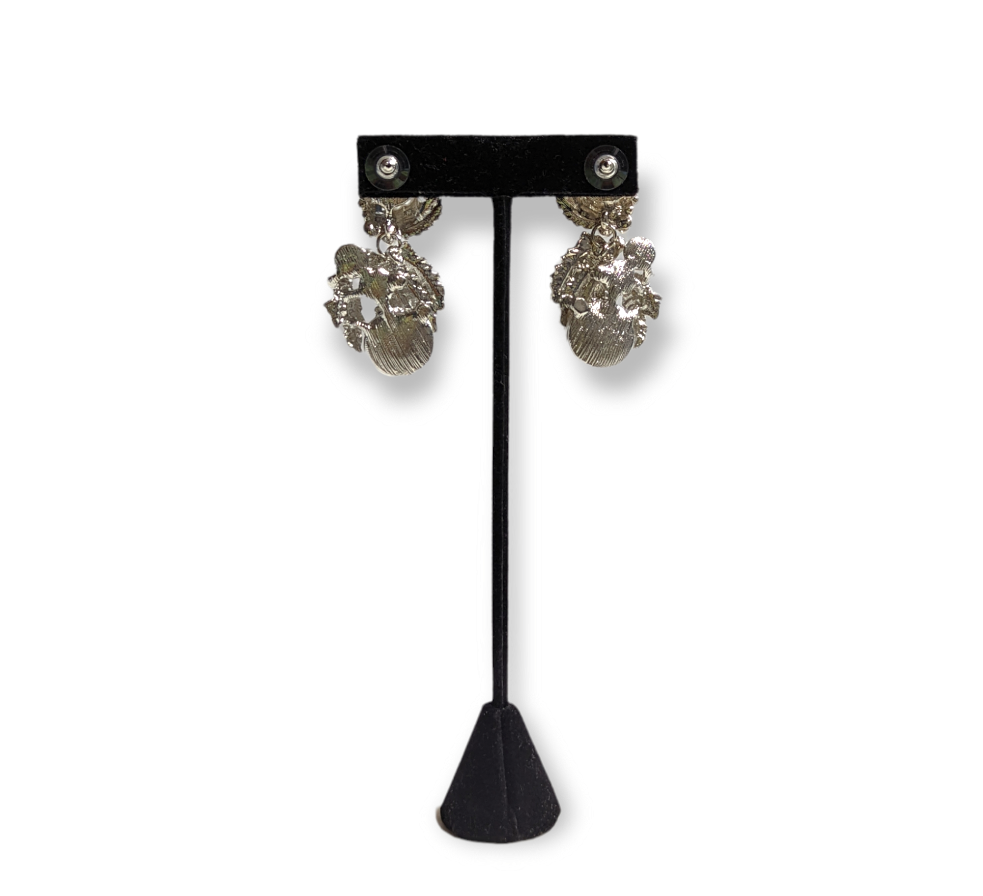 Elegant Pearls & Décor Earrings featuring lustrous pearls with decorative accents, perfect for formal or casual outfits.