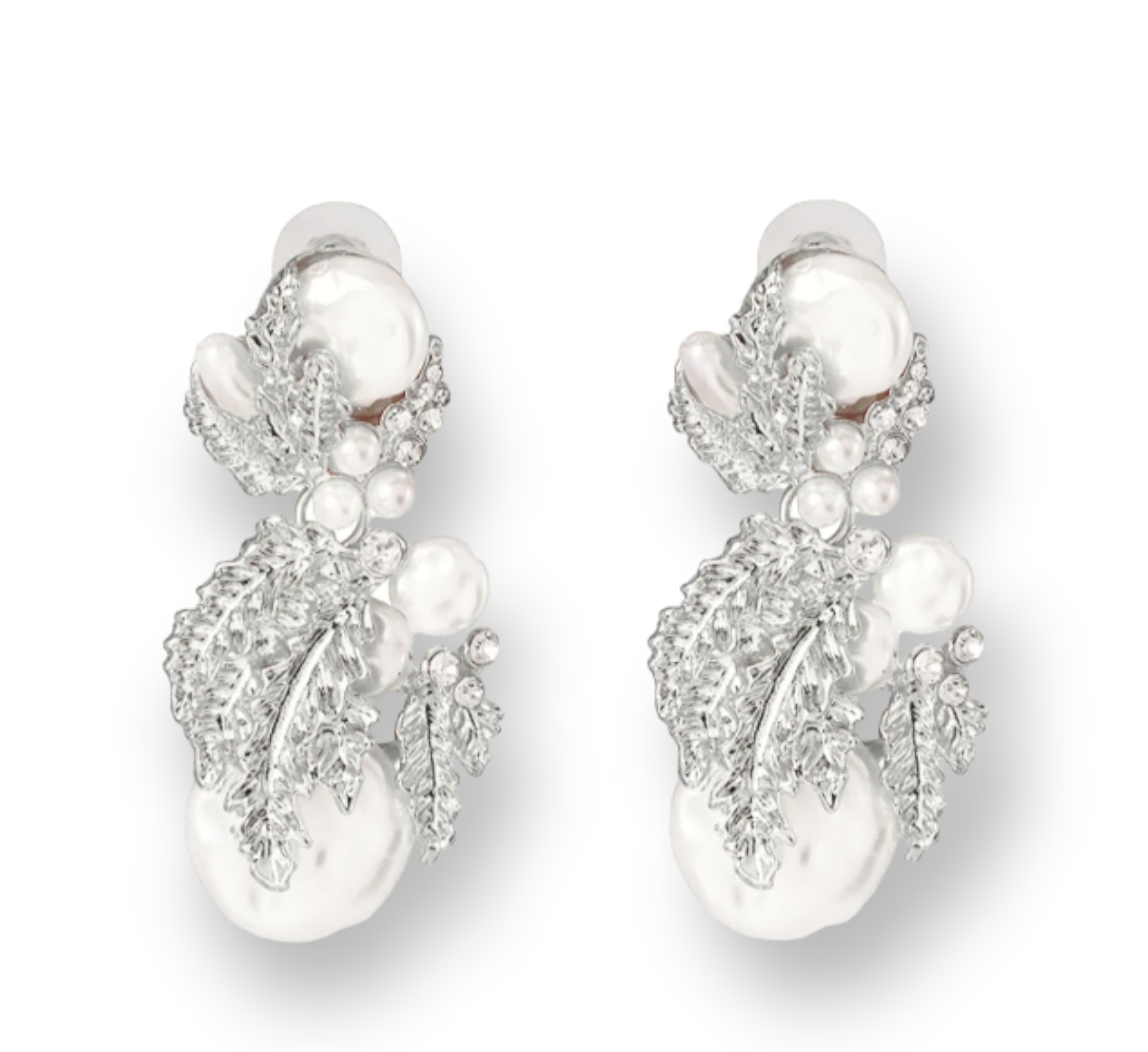 Elegant Pearls & Décor Earrings featuring lustrous pearls with decorative accents, perfect for formal or casual outfits.
